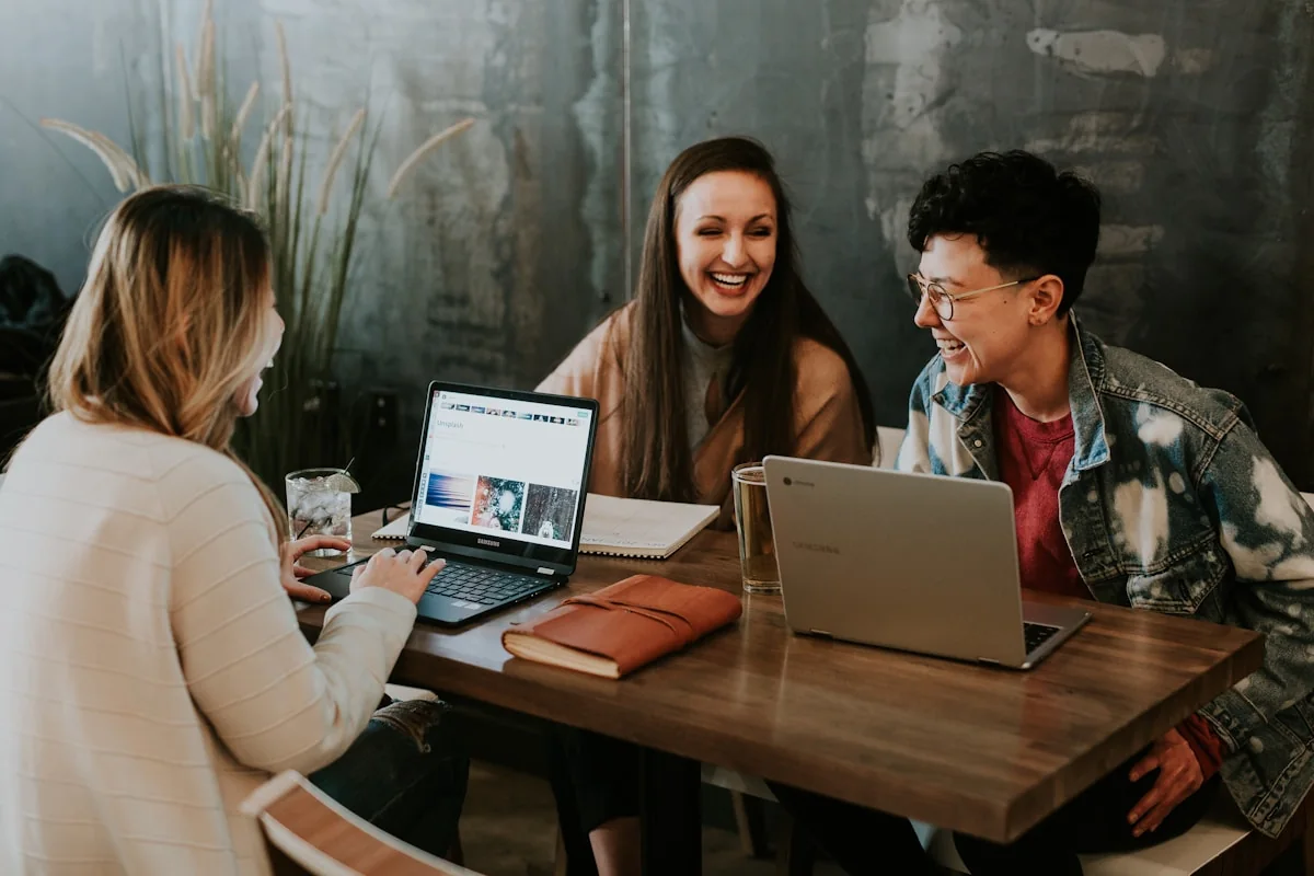 Diverse professionals collaborating during a Betty Can Collective workshop